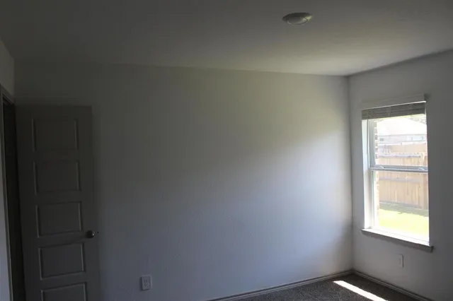 a kitchen with a sink stove and refrigerator