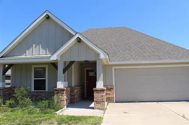 a front view of house with yard