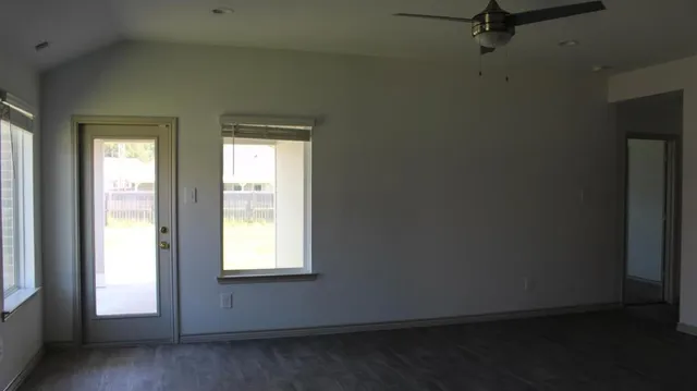 a kitchen with a sink and a refrigerator