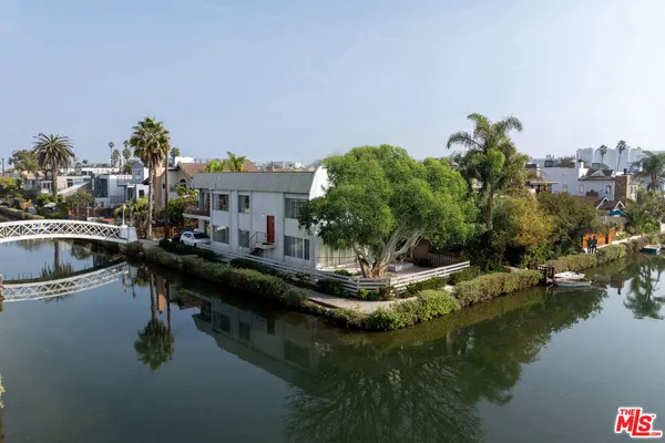 a view of a lake with a house