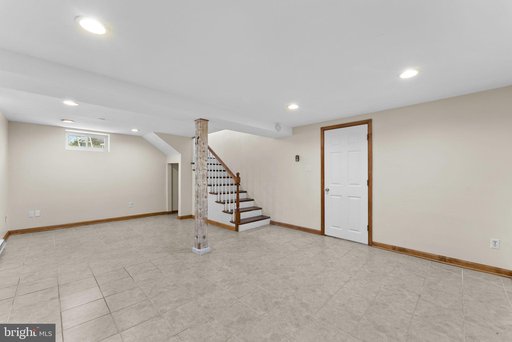 539 Old Meetze Road Warrenton, VA 20186 - Photo 22 of 30 a view of an empty room with stairs