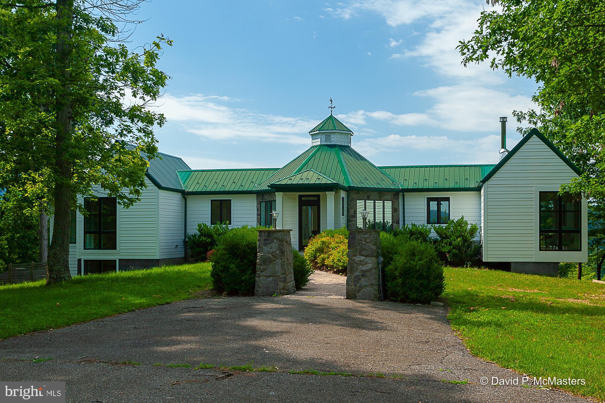 2925 Spohrs Road Berkeley Springs, WV 25411 - Photo 1 of 41 Contemporary home with top of the world views.