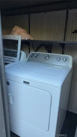 a sink with washer and dryer