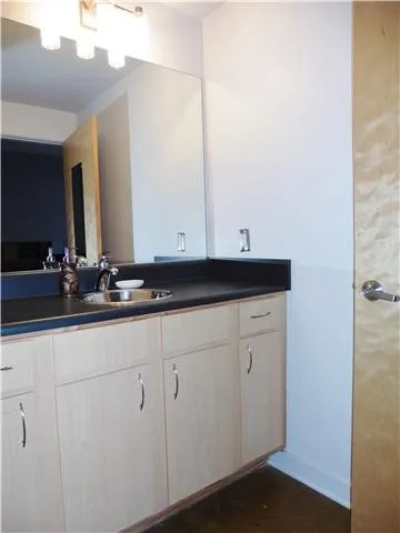 a sink with a mirror