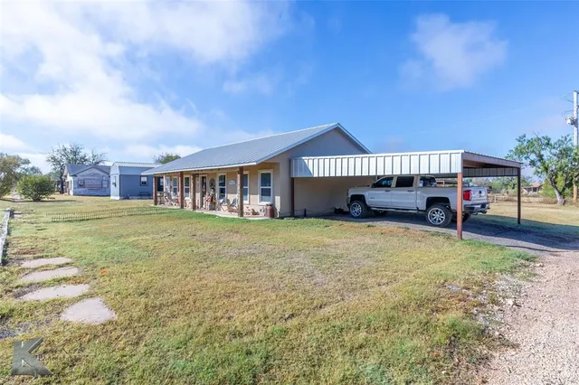 a swimming pool with barbeque oven