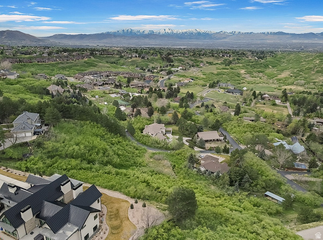 10667 Hidden Ridge Lane Sandy, UT 84092 - Photo 10 of 21 Aerial perspective of suburban area with mountains