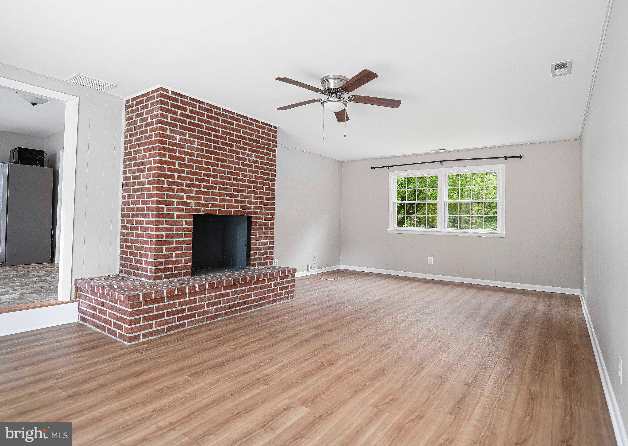 205 East Ring Factory Road Bel Air, MD 21014 - Photo 17 of 35 Accent brick wall - fireplace is not functioning