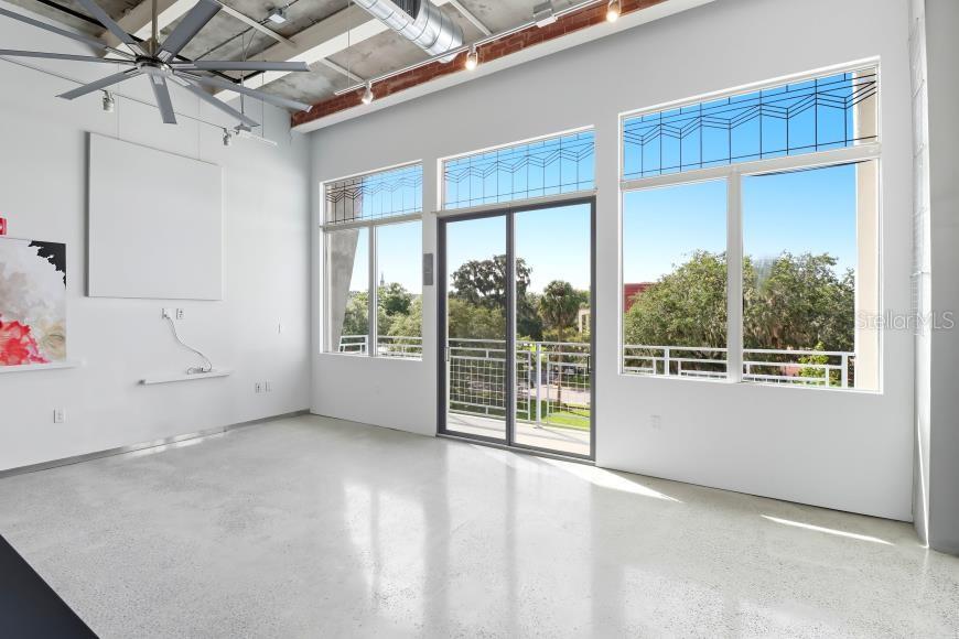 302 Southeast Broadway Street, Unit 460 Ocala, FL 34471 - Photo 14 of 47 an empty room with windows