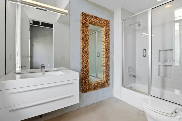 a view of a room with a bathroom