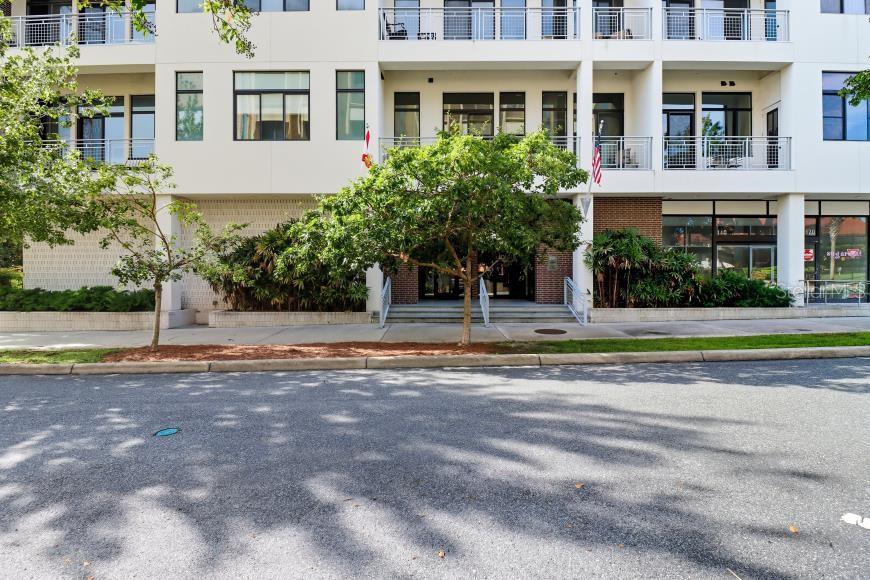 302 Southeast Broadway Street, Unit 460 Ocala, FL 34471 - Photo 5 of 47 a view of a house with a swimming pool