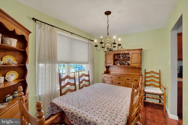 a very nice looking dining room with a table and chairs