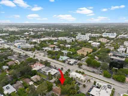 an aerial view of city and lake