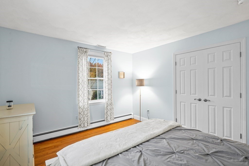 53 Elder Road Needham, MA 02494 - Photo 17 of 33 a bedroom with a bed and a window