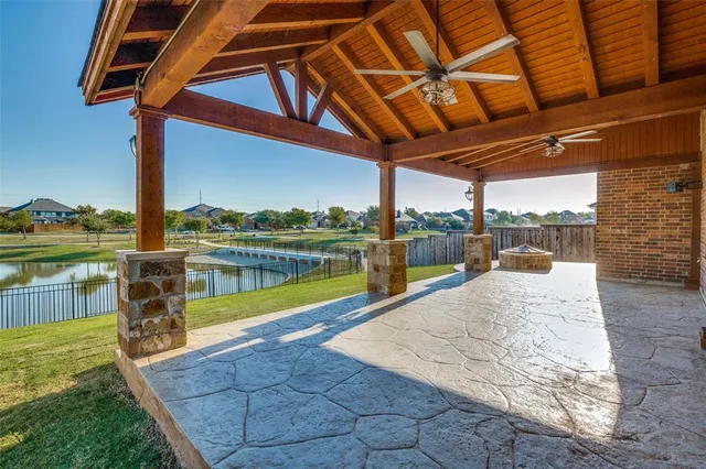 a view of a swimming pool with a patio