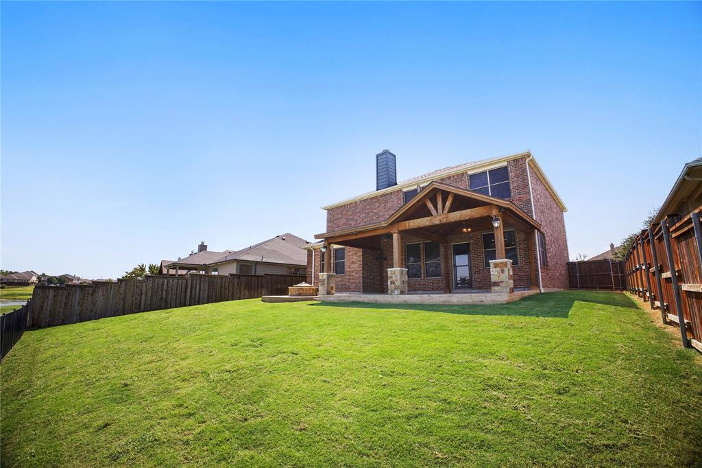 14904 Riverside Drive Little Elm, TX 75068 - Photo 26 of 28 a view of a house with a yard