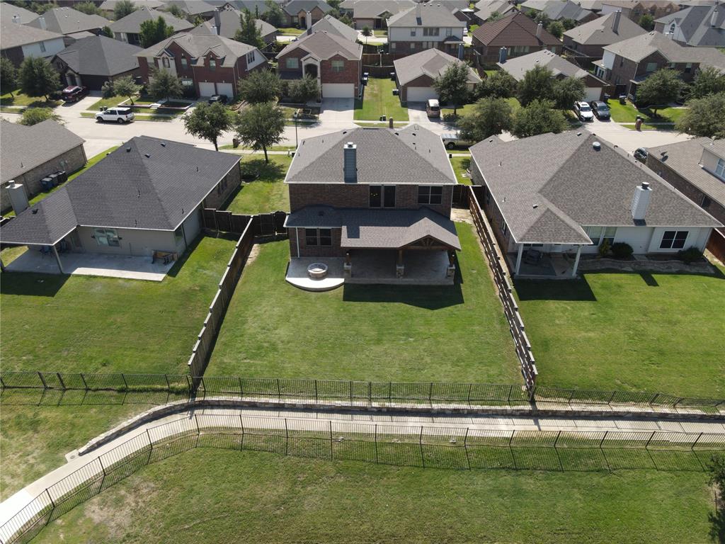 14904 Riverside Drive Little Elm, TX 75068 - Photo 27 of 28 an aerial view of a house with a garden and lake view