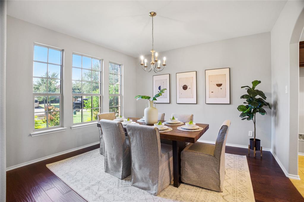 14904 Riverside Drive Little Elm, TX 75068 - Photo 5 of 28 a view of a dining room with furniture window and wooden floor