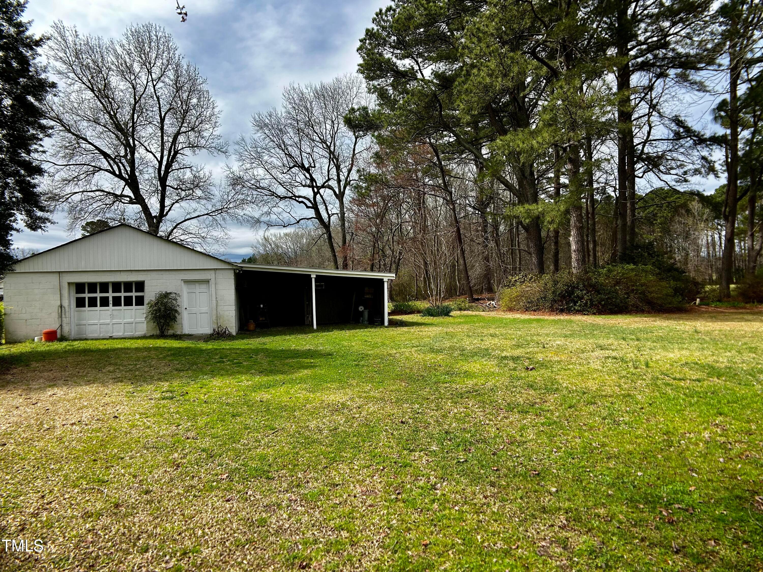 2981 Barber Mill Road Clayton, NC 27520 - Photo 23 of 28 a front view of house with yard and green space