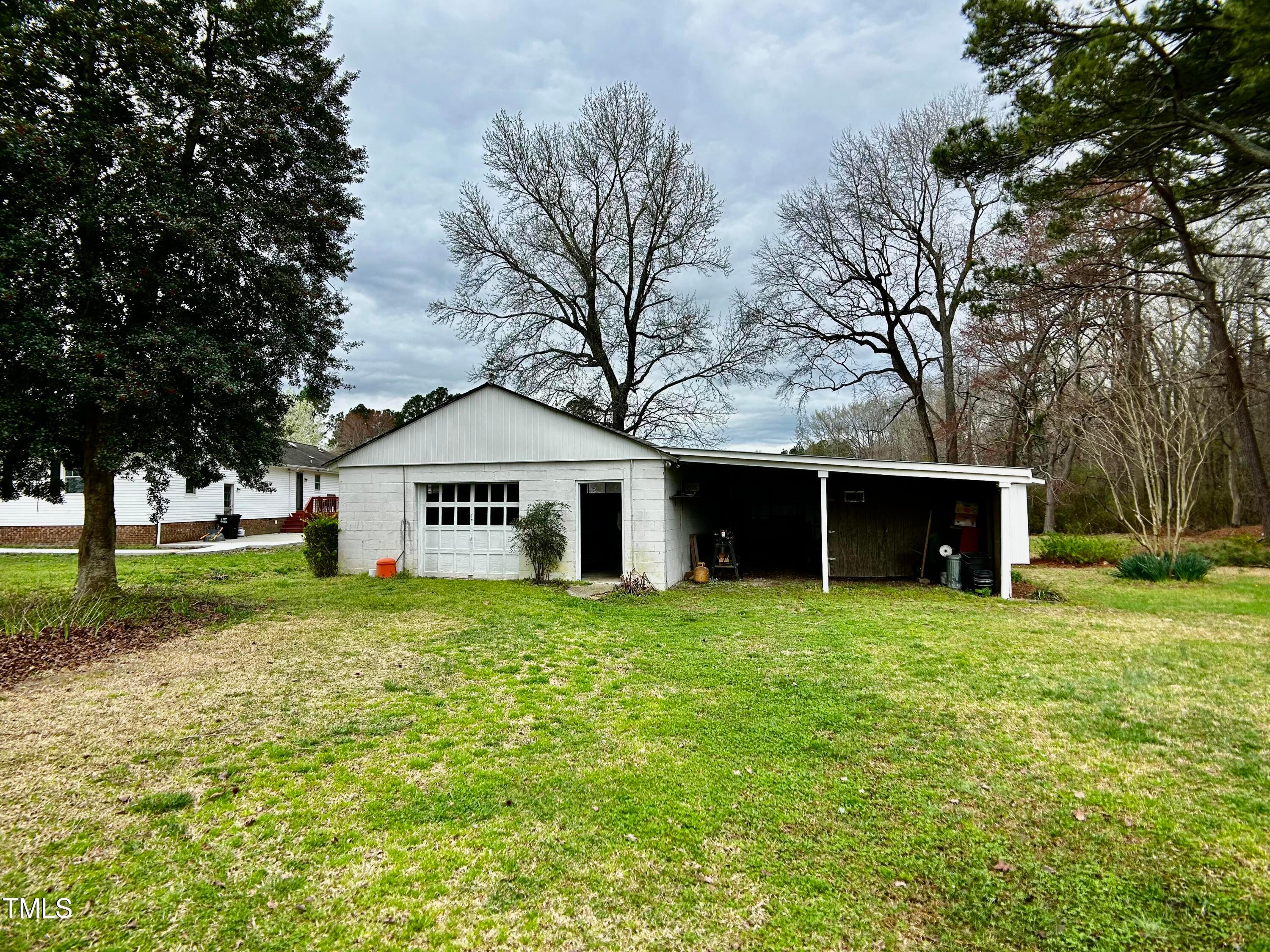2981 Barber Mill Road Clayton, NC 27520 - Photo 24 of 28 a house with trees in front of it