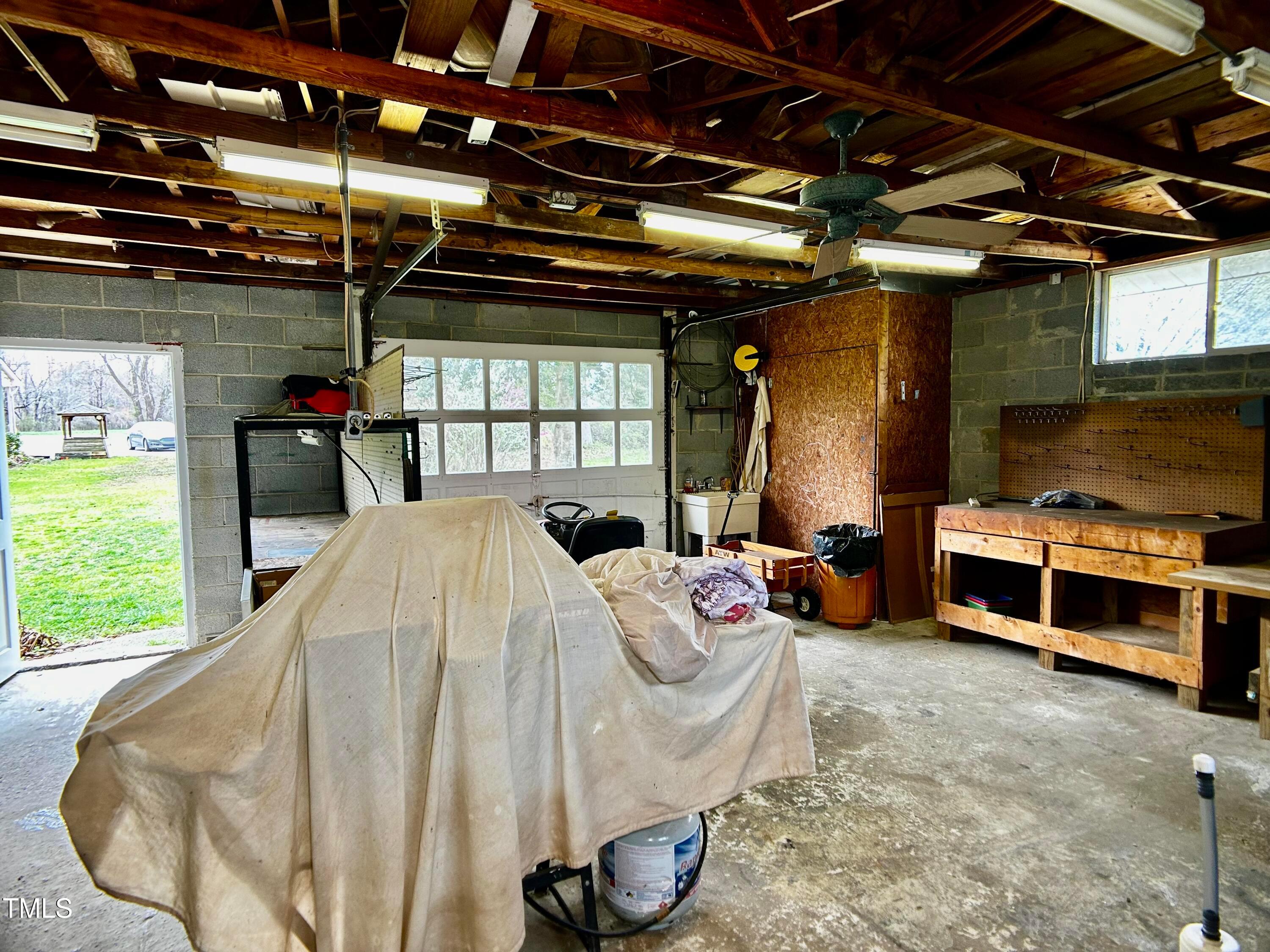2981 Barber Mill Road Clayton, NC 27520 - Photo 25 of 28 a bed room with a bed and a chair