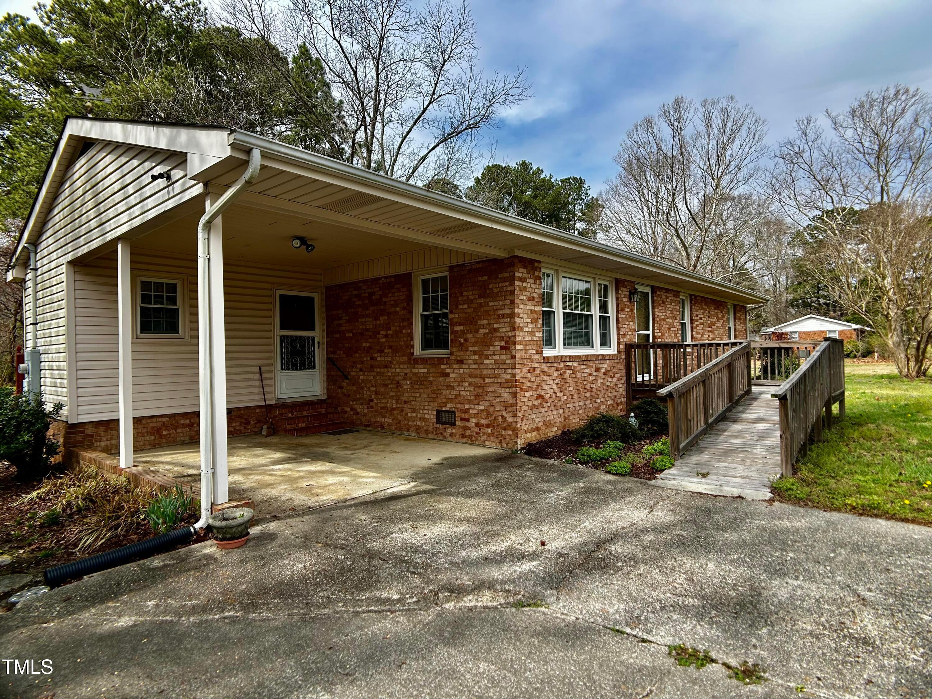 2981 Barber Mill Road Clayton, NC 27520 - Photo 3 of 28 a view of a house with a yard