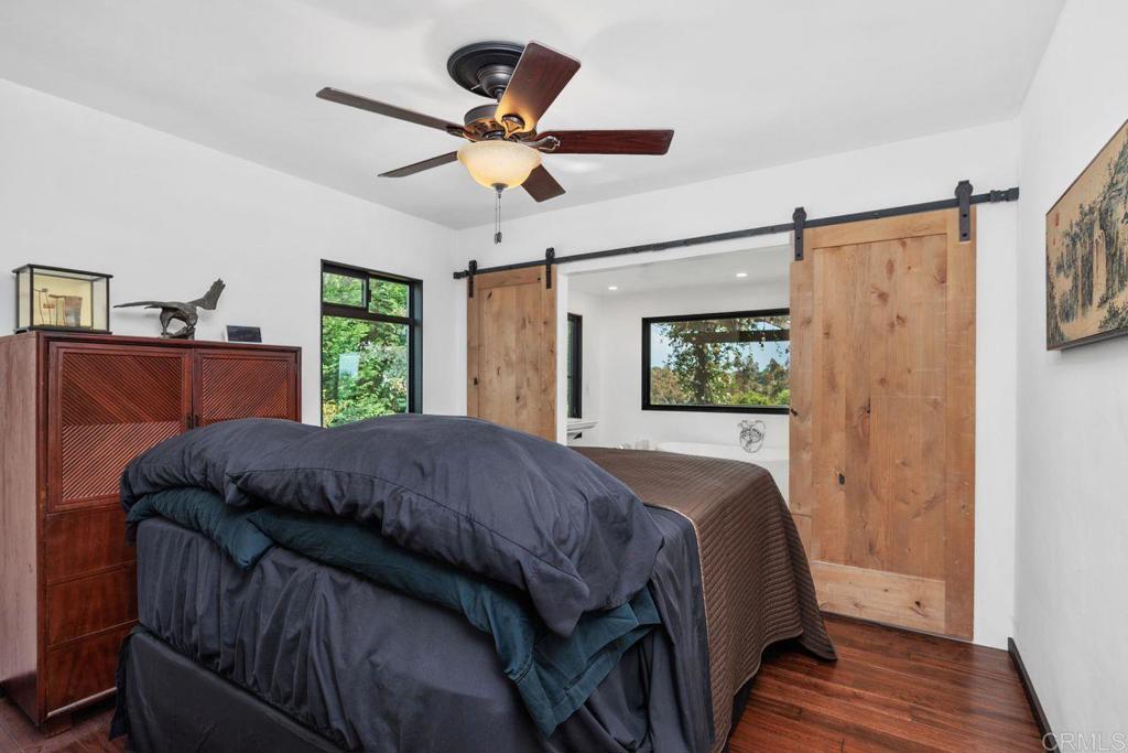 1107 Prospect Circle Vista, CA 92081 - Photo 18 of 52 a bedroom with a bed and a window