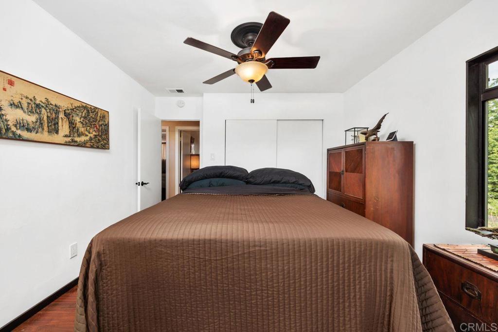 1107 Prospect Circle Vista, CA 92081 - Photo 20 of 52 a bedroom with a bed and window