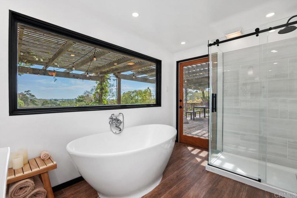 1107 Prospect Circle Vista, CA 92081 - Photo 24 of 52 a bathroom with a bathtub and a shower