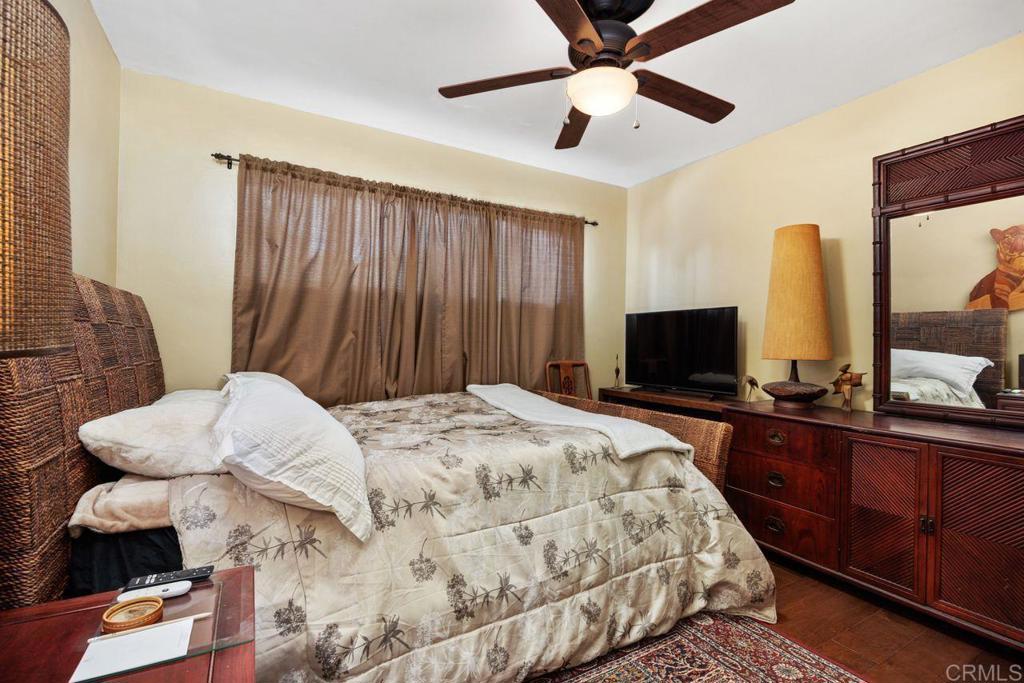 1107 Prospect Circle Vista, CA 92081 - Photo 26 of 52 a bedroom with a bed and a television