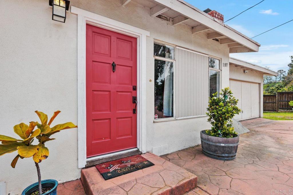 1107 Prospect Circle Vista, CA 92081 - Photo 3 of 52 a vase of flowers sitting on a table