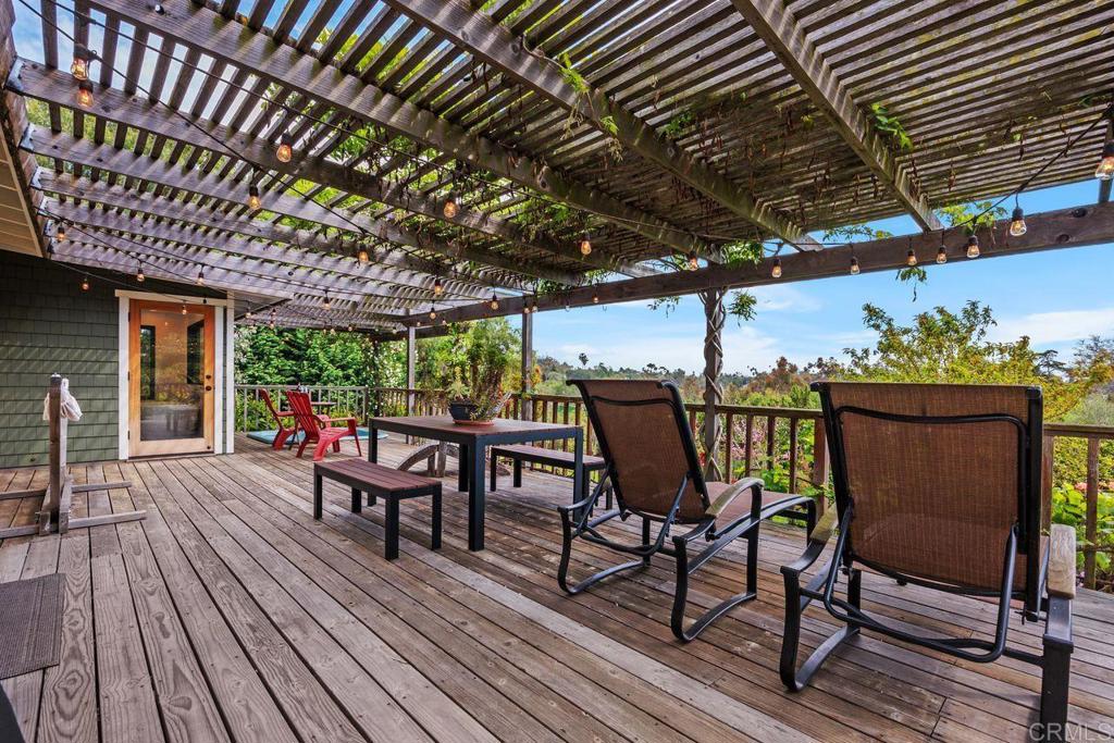 1107 Prospect Circle Vista, CA 92081 - Photo 31 of 52 a view of a table and chairs in patio with wooden floor