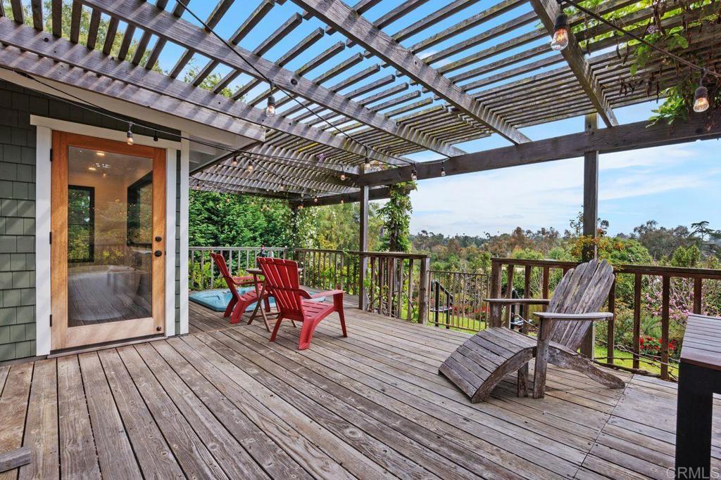 1107 Prospect Circle Vista, CA 92081 - Photo 33 of 52 a deck with a table and chairs
