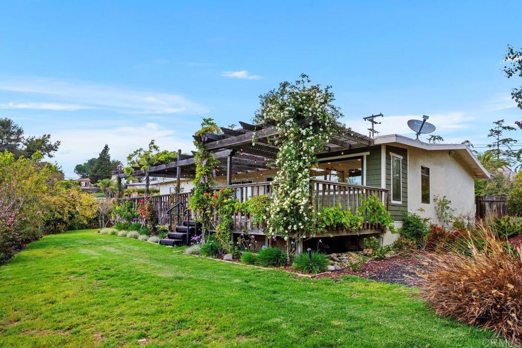 1107 Prospect Circle Vista, CA 92081 - Photo 36 of 52 a view of a house with a big yard plants and large trees