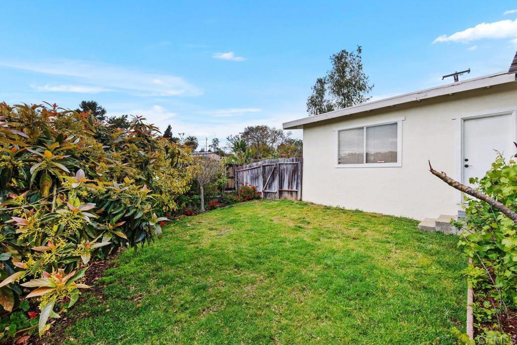 1107 Prospect Circle Vista, CA 92081 - Photo 38 of 52 a view of a house with a yard and garage