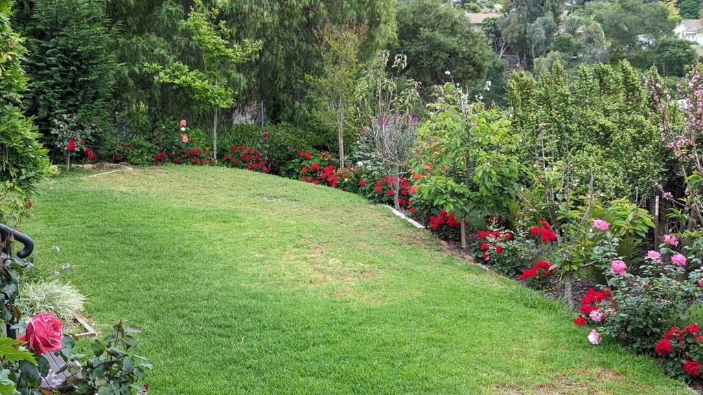1107 Prospect Circle Vista, CA 92081 - Photo 41 of 52 a view of a flower garden in a backyard