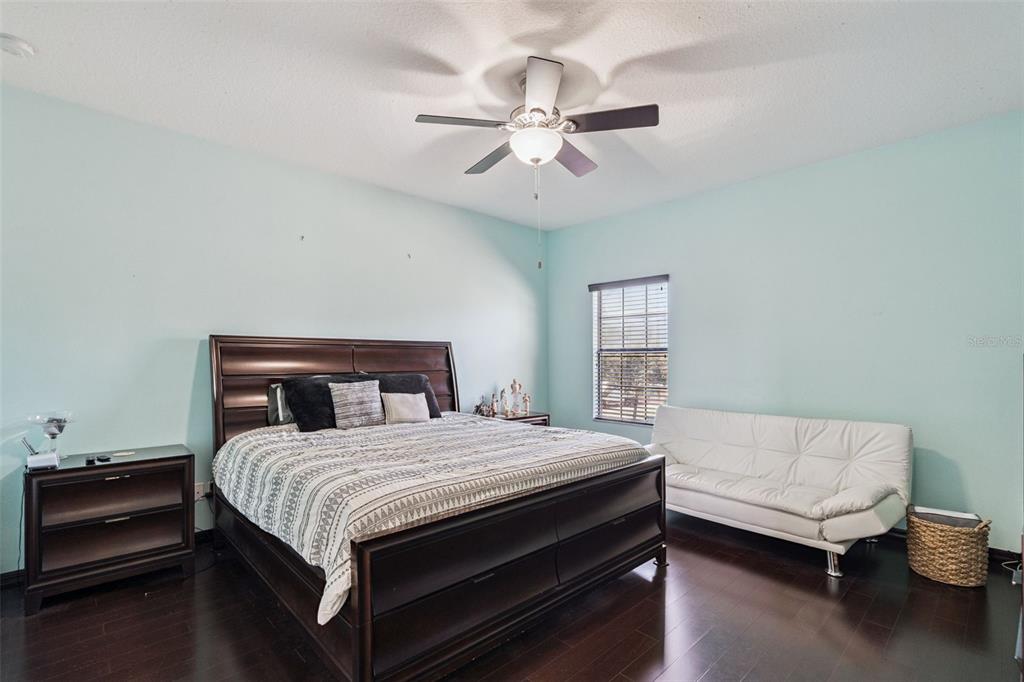 127 Verde Way DeBary, FL 32713 - Photo 14 of 77 a bedroom with a bed and window