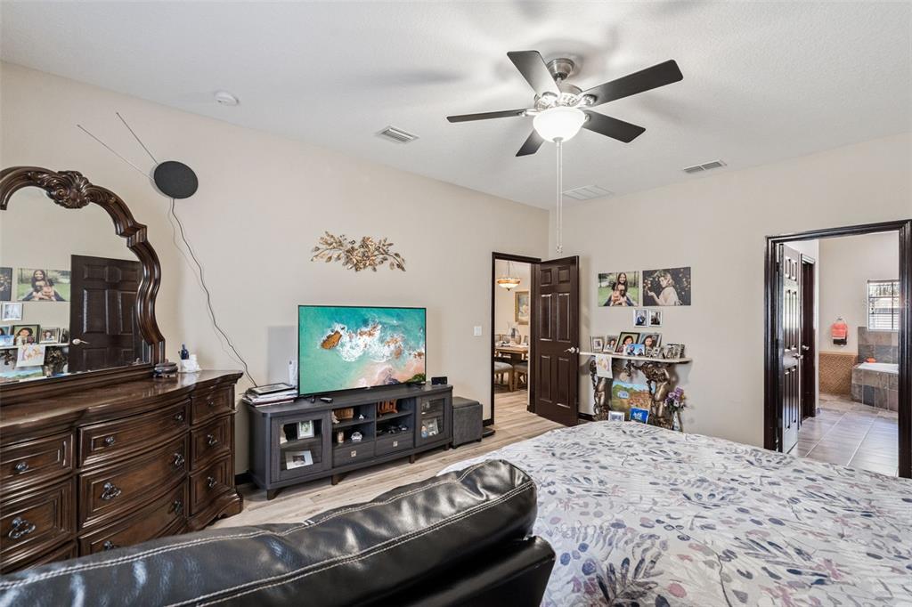 127 Verde Way DeBary, FL 32713 - Photo 26 of 77 a living room with couch and a flat screen tv