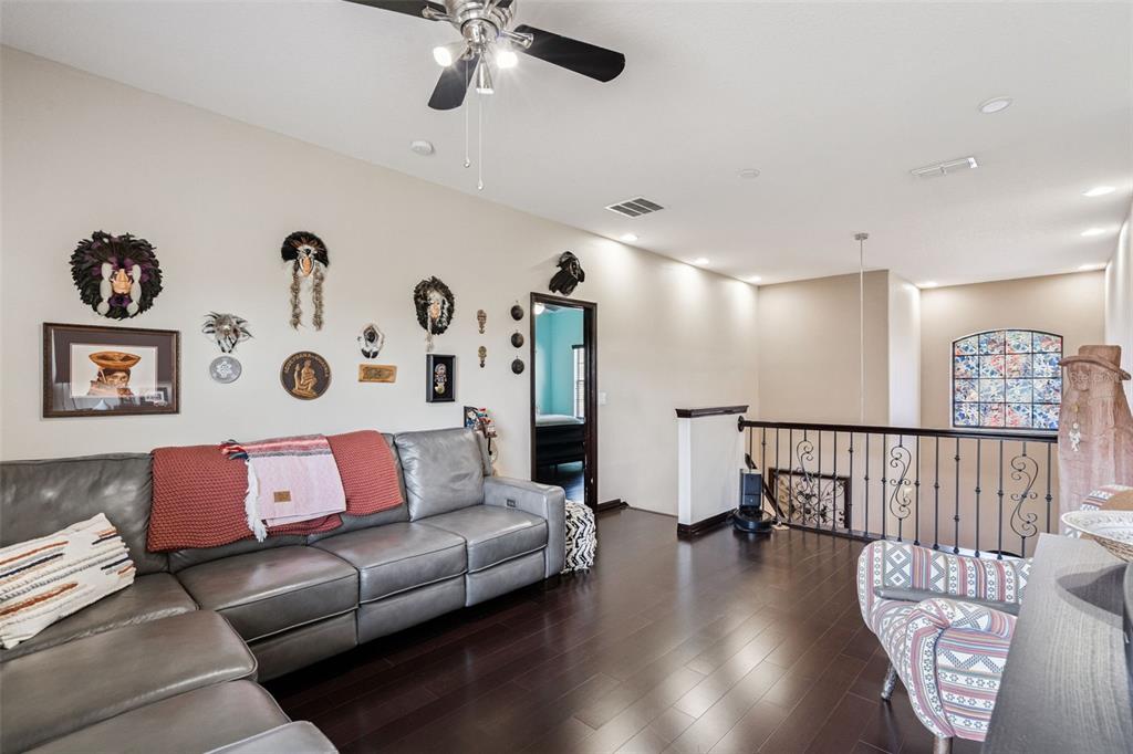 127 Verde Way DeBary, FL 32713 - Photo 30 of 77 a living room with furniture and a wooden floor