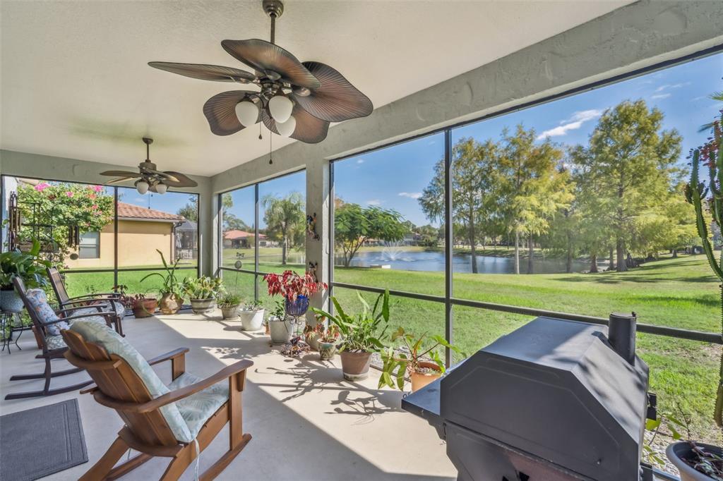 127 Verde Way DeBary, FL 32713 - Photo 36 of 77 a view of a patio with a table chairs and a backyard