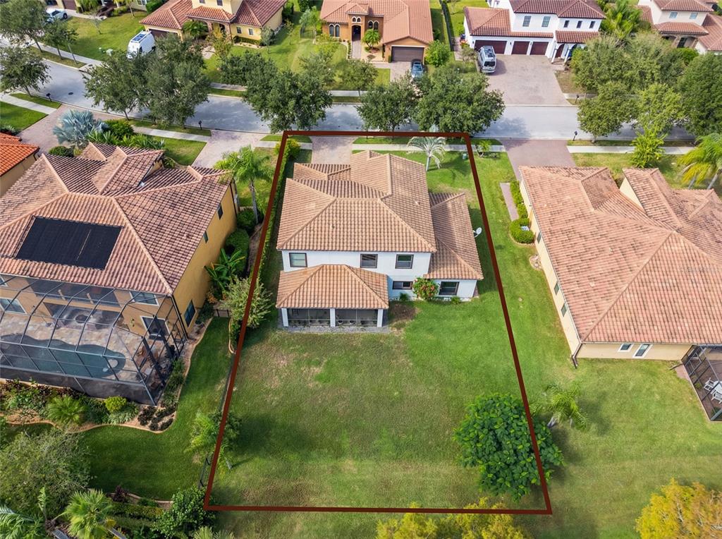 127 Verde Way DeBary, FL 32713 - Photo 45 of 77 an aerial view of a house with a garden and swimming pool