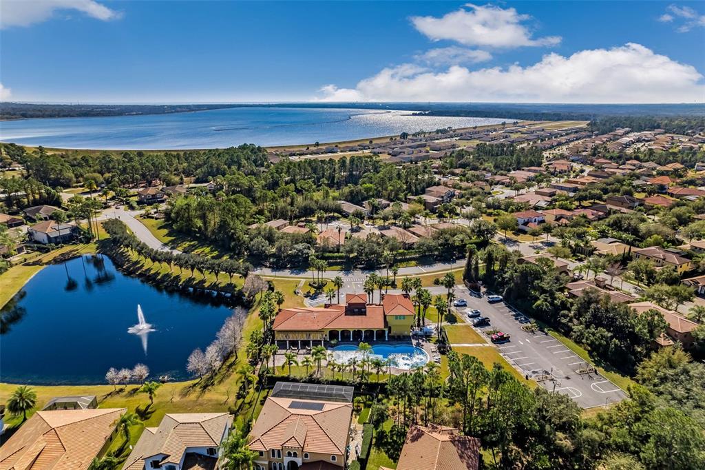 127 Verde Way DeBary, FL 32713 - Photo 65 of 83 an aerial view of a city with lots of residential buildings ocean and mountain view in back