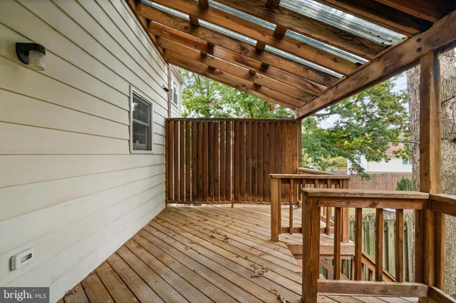 a view of a house with a yard and garage