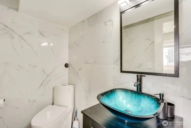 a picture of a bathroom with a window