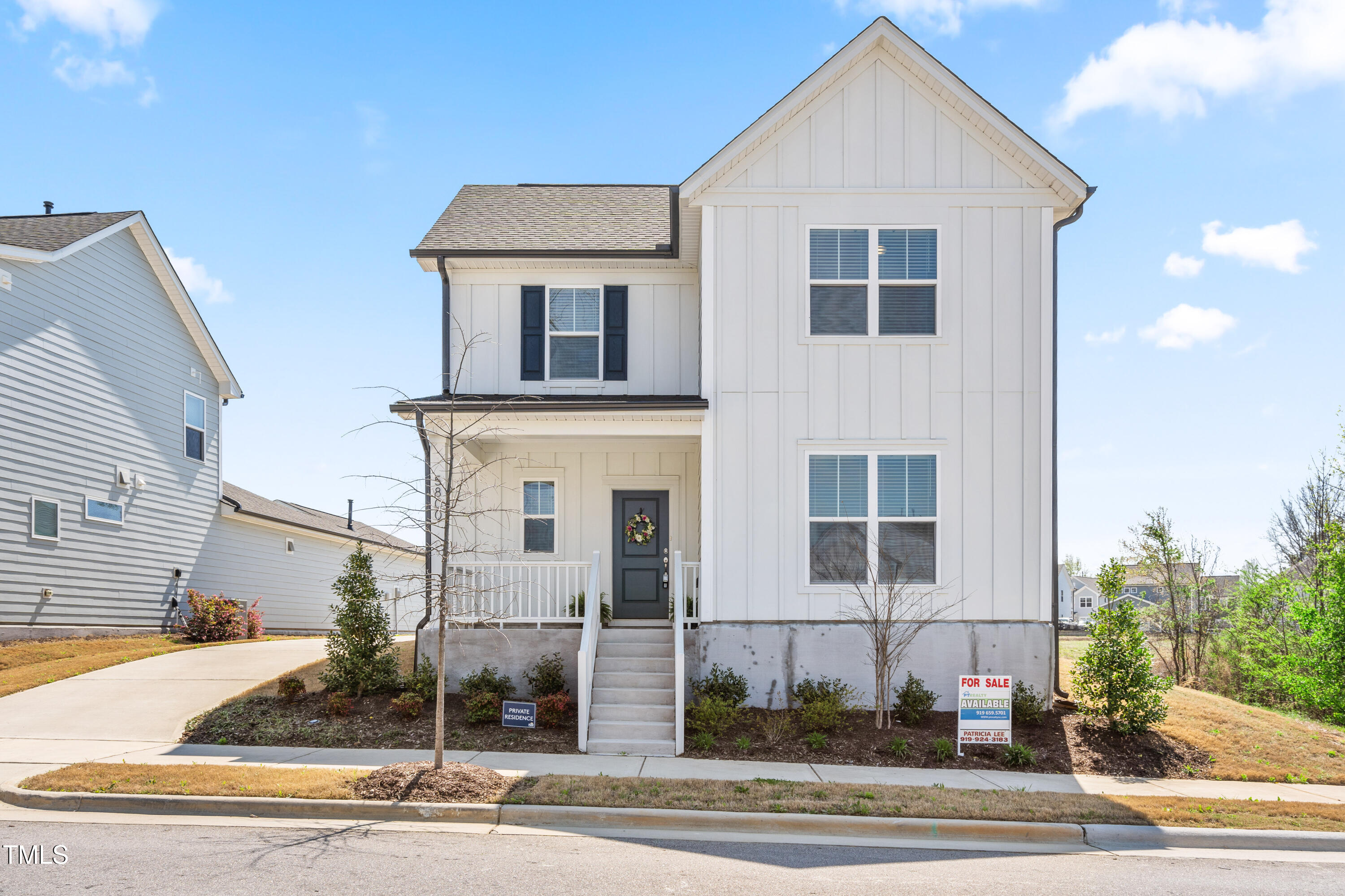 5800 Agrinio Way Raleigh, NC 27603 - Photo 1 of 38 a front view of a house with a garage