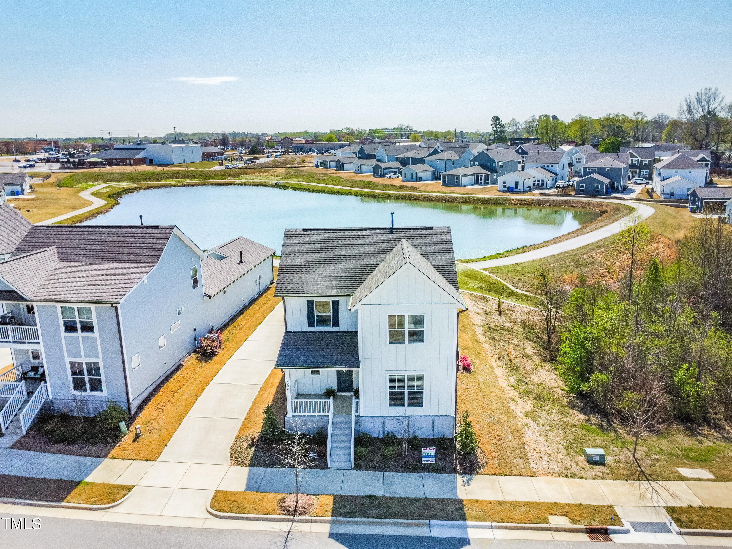 5800 Agrinio Way Raleigh, NC 27603 - Photo 33 of 38 a view of a swimming pool with outdoor seating and yard