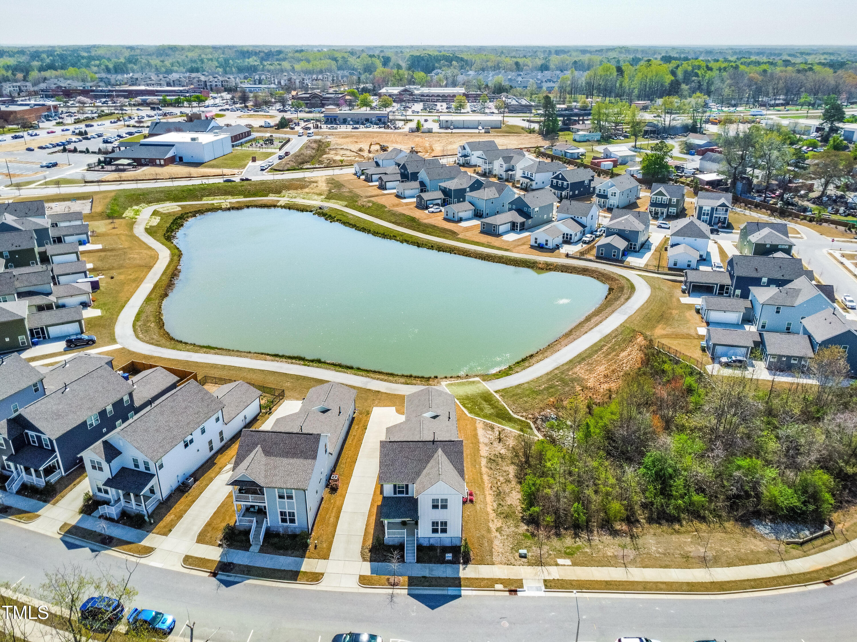 5800 Agrinio Way Raleigh, NC 27603 - Photo 35 of 38 an aerial view of residential houses with outdoor space