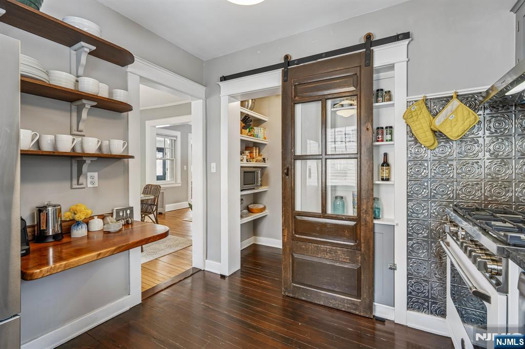 31 Nassau Road Montclair, NJ 07043 - Photo 13 of 33 a kitchen with stainless steel appliances granite countertop a refrigerator and a stove