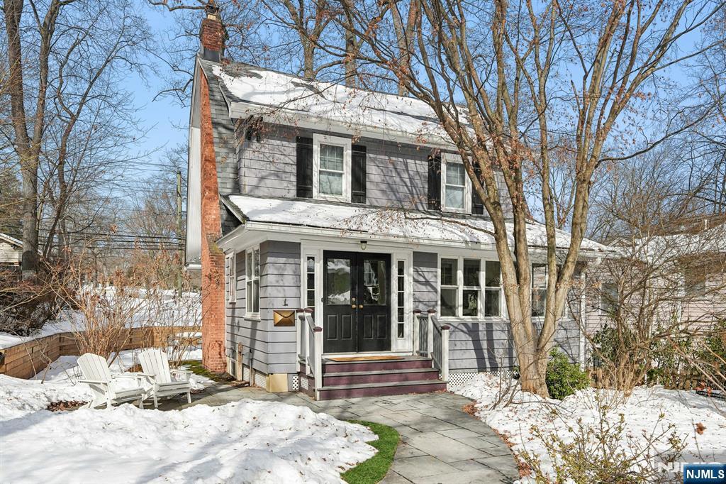 31 Nassau Road Montclair, NJ 07043 - Photo 2 of 33 a view of a house with a yard covered in snow