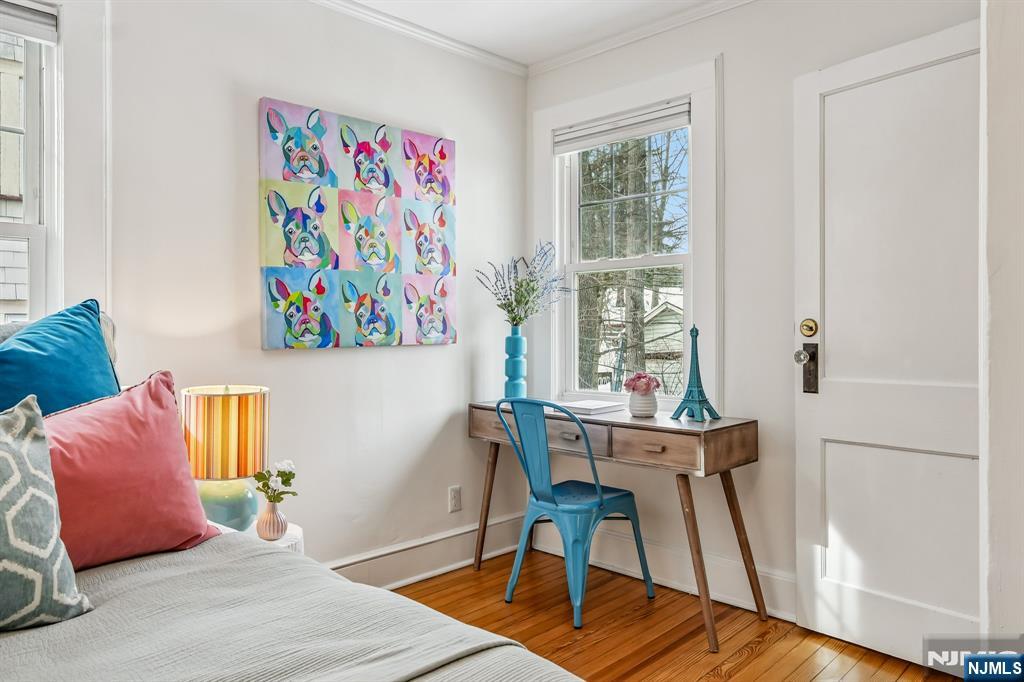 31 Nassau Road Montclair, NJ 07043 - Photo 22 of 33 a view of a bedroom with a table and a chair
