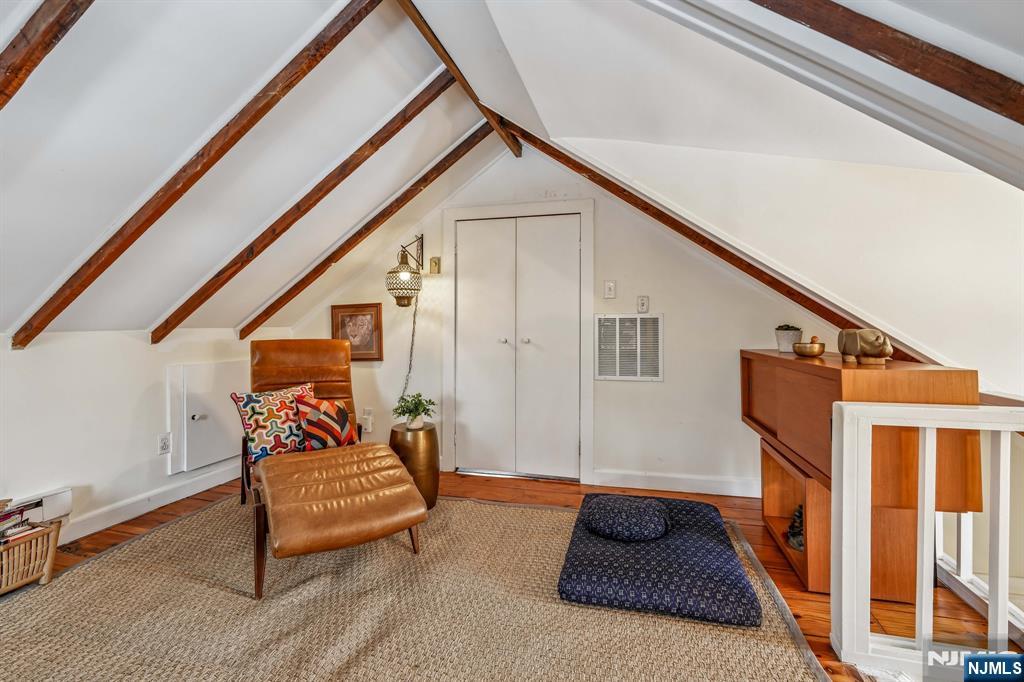 31 Nassau Road Montclair, NJ 07043 - Photo 25 of 33 a hallway with stairs and a couch